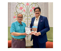 Books Presented to Dr. Sandeep Marwah by Author Ashok K. Sharma in Lucknow